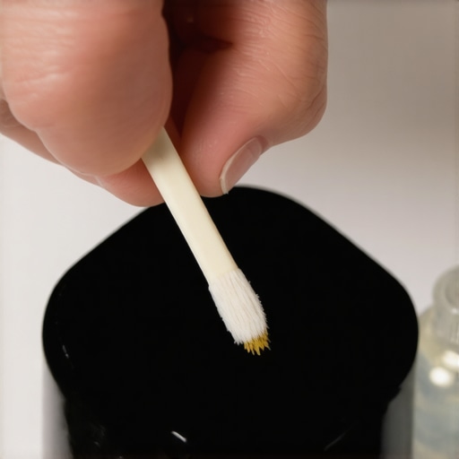 Close up of cleaning gold contacts on a smart ring with a cotton swab
