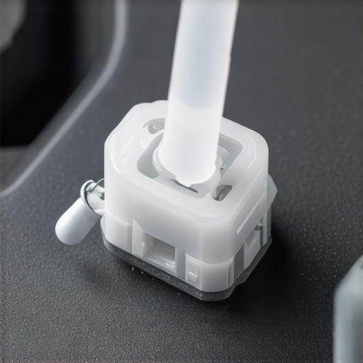 Macro view of cleaning a sticky laptop key switch with a swab