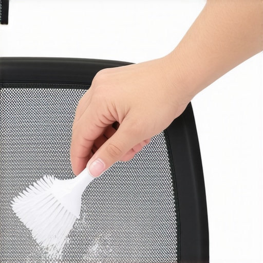 Properly brushing mesh chair fibers Man using a soft brush to clean a mesh office chair